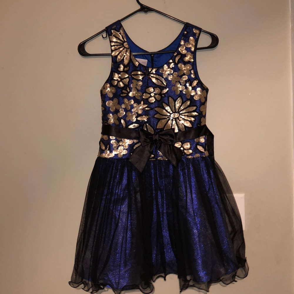 A royal blue gold sequin mini dress.